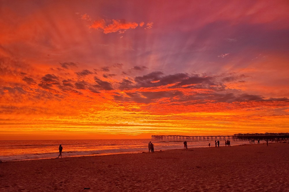 a sunset over a body of water