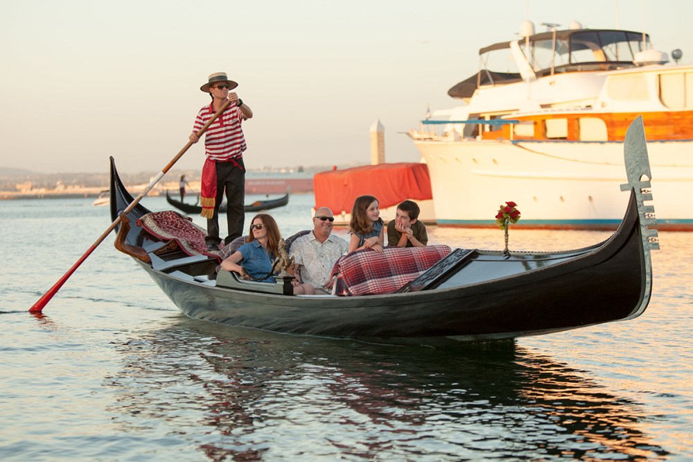 A familiy celebrating Mother's Day in San Diego on a gondola in coronado